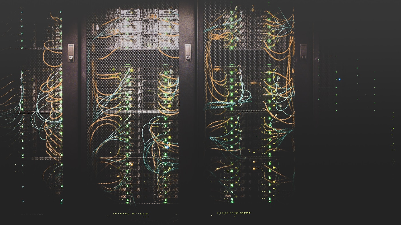 Healthcare data infrastructure racks carrying the patient data an AI governance and security review maps against HIPAA technical safeguards